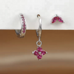 FJØRNA unisex minimalist piercing set with gold and green stainless steel hoops and studs, stylish accessories for women.