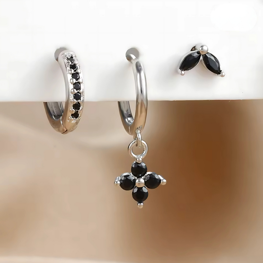 Unisex minimalist piercing set by FJØRNA featuring gold and green stainless steel hoops and studs for women accessories.