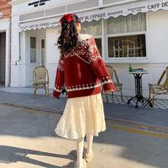 FJØRNA Lily Christmas Jumper for women, red knitwear with festive holiday design, trendy chic winter sweater.