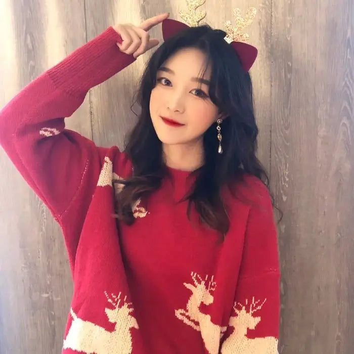 FJØRNA Lily Christmas Jumper for women, trendy chic knitwear with festive red design, perfect for holiday fashion.