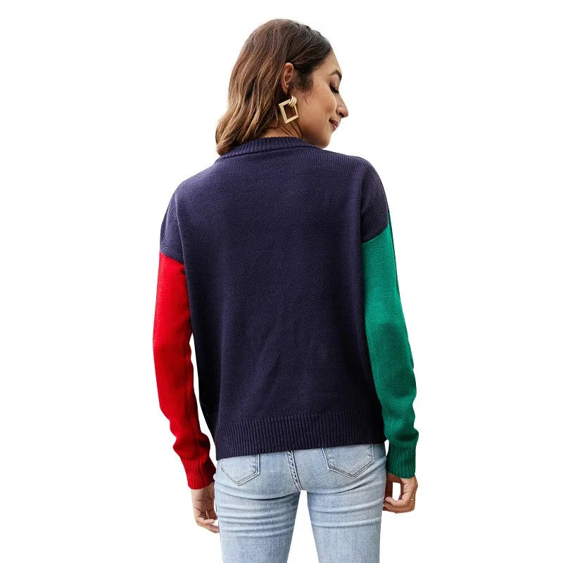 Navy blue FJØRNA Clara Christmas jumper for women with festive holiday design, cozy knit sweater for ladies' Christmas celebration.