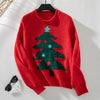 Red FJØRNA Clara Christmas Jumper for women, festive casual pullover with holiday-themed design, cozy winter sweater.