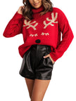Red Emma Christmas Jumper for women by FJØRNA featuring festive holiday design and cozy pullover style.