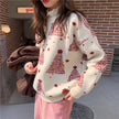 FJØRNA Sophie women's Christmas jumper, cozy white knit sweater with festive holiday design, perfect for winter celebrations.