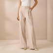 Beige high-waist wide-leg pull-on trousers for women by FJØRNA, stylish and comfortable pants with a relaxed fit.
