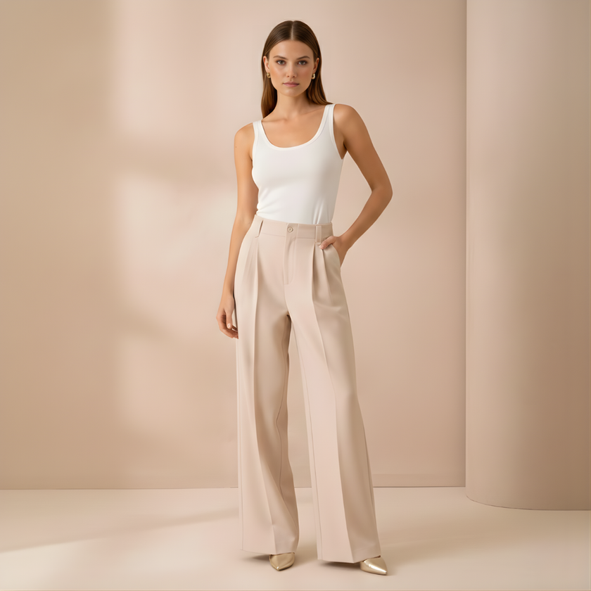 Beige high-waist, wide-leg pull-on pants for women by FJØRNA, showcasing a relaxed, loose fit and comfortable style.