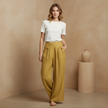 White high-waist cotton linen wide-leg trousers for women with pockets from FJØRNA, relaxed fit and stylish comfort.