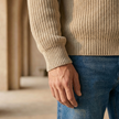 Men's black FJØRNA knit jumper with half-zip collar, stylish and versatile sweater for casual and smart looks.