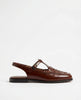 Brown Italian leather woven slingback sandals for women, stylish FJØRNA shoes with a comfortable open heel design.