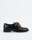FJØRNA women's dual-tone leather loafers with cushioned insoles, stylish handcrafted shoes displayed on a white studio background.