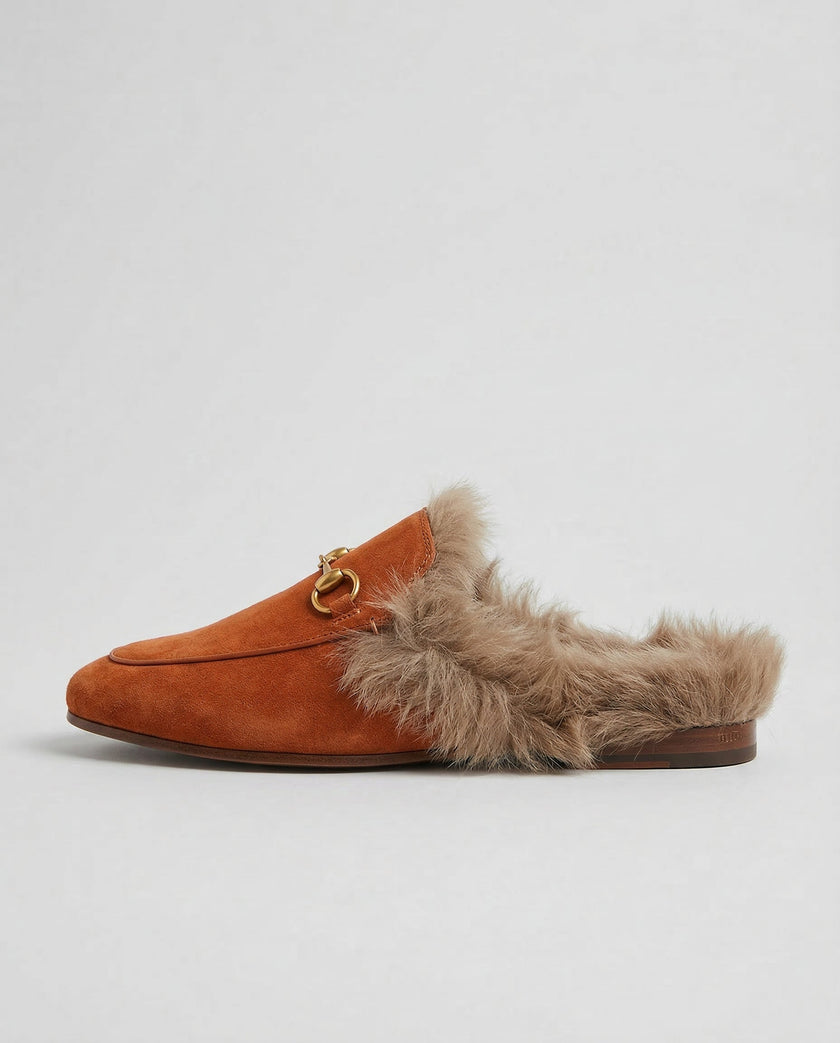 FJØRNA women's plush fur mule slippers with slip-on design and cozy lining, perfect for indoor comfort and luxury footwear.