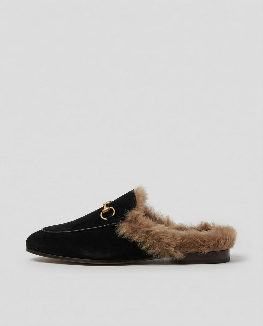 FJØRNA women's plush fur mule slippers with slip-on design, featuring soft lining and cozy texture for comfortable indoor wear.