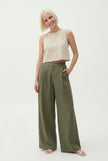 FJØRNA knit wide-leg women's trousers with elastic waistband, showcasing comfortable, stylish pants in a relaxed fit.
