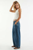 Women’s cotton wide-leg jeans with drawstring waist by FJØRNA, shown in a casual style with a relaxed fit.