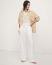 FJØRNA linen wide-leg loose pull-on trousers for women, showing soft fabric and relaxed fit on a model.