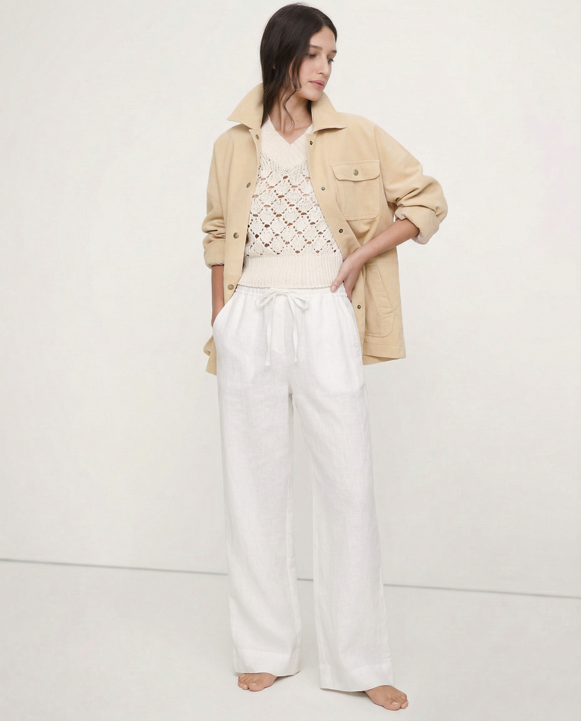 FJØRNA linen wide-leg loose pull-on trousers for women, showing soft fabric and relaxed fit on a model.