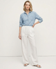 FJØRNA women's knit wide-leg trousers with drawstring, showing soft fabric and relaxed fit on a model.