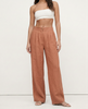 FJØRNA women's linen cropped culotte trousers with wide-leg design, showcasing soft, textured fabric and relaxed fit.