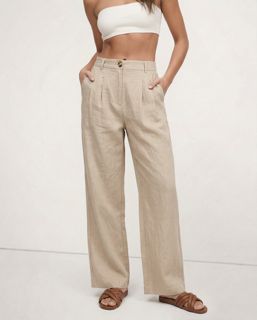 FJØRNA women’s linen cropped culotte trousers with wide leg fit, showing lightweight, textured fabric and relaxed style.