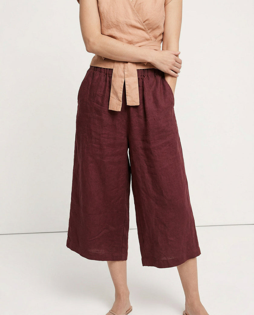 FJØRNA linen wide-leg trousers for women with drawstring pull-on design, showcasing high-quality, breathable linen fabric.