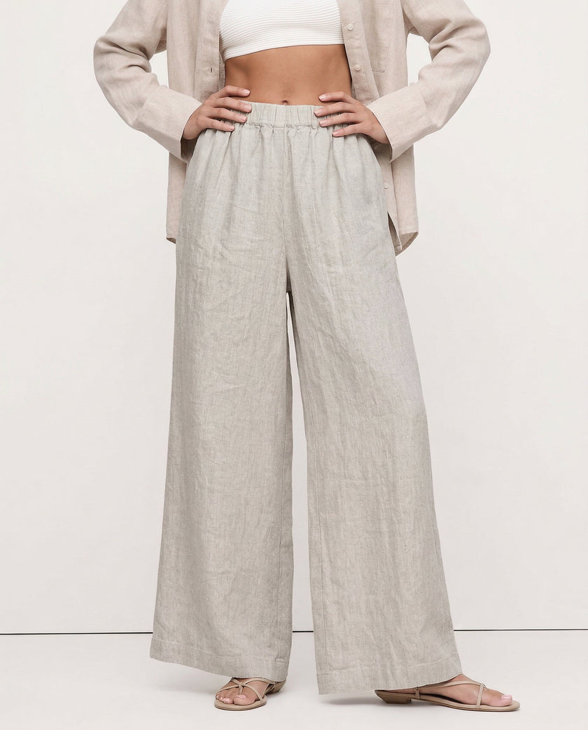 FJØRNA linen wide-leg trousers for women with drawstring pull-on design, showing high-quality, breathable linen fabric.