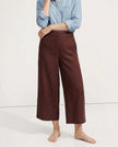 FJØRNA linen wide-leg women’s trousers with drawstring, showcasing high-quality linen fabric and relaxed fit.