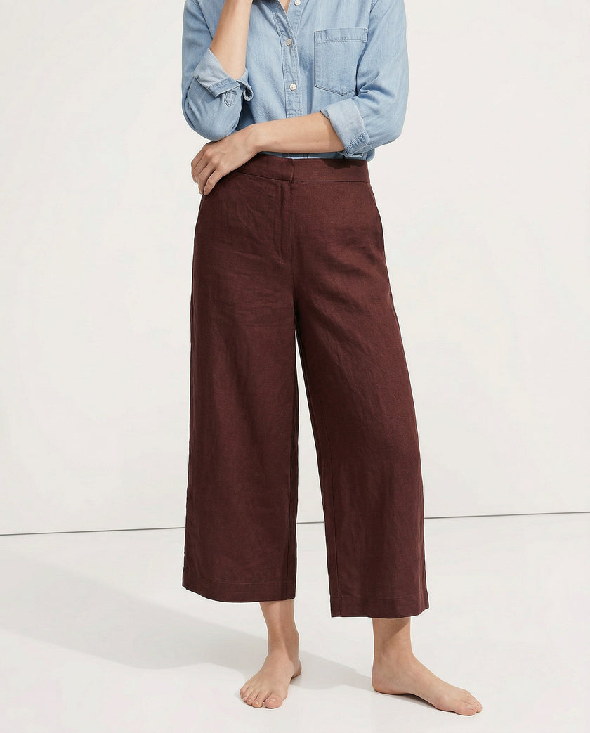 FJØRNA linen wide-leg women’s trousers with drawstring, showcasing high-quality linen fabric and relaxed fit.