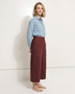 FJØRNA linen wide leg women’s trousers with drawstring, showing high-quality linen fabric and relaxed fit on a neutral background.