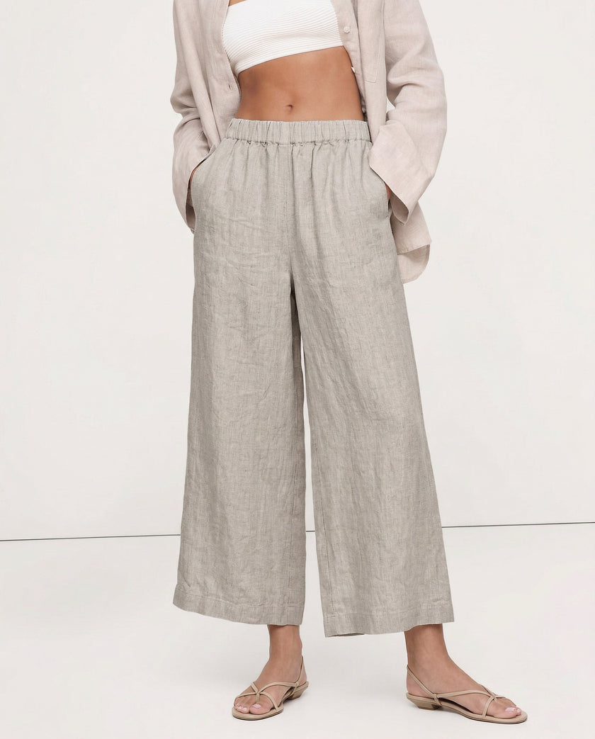 FJØRNA women’s linen wide-leg trousers with drawstring, showcasing high-quality, realistic linen fabric and comfortable pull-on design.