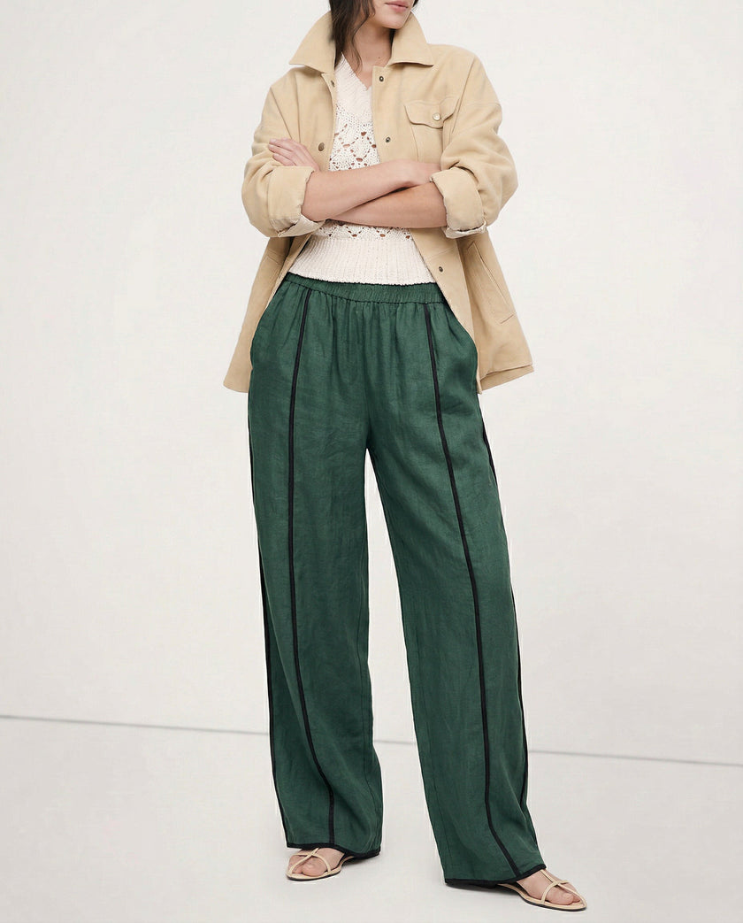 FJØRNA linen wide leg women's trousers with elastic waist, showcasing high-quality, realistic linen fabric and stylish fit.
