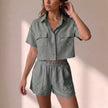 Gray women's summer two-piece co-ord set by FJØRNA featuring relaxed fit and pockets, perfect for casual wear.