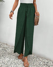 Green lightweight summer trousers for women by FJØRNA, wide-leg breathable casual pants perfect for warm weather.
