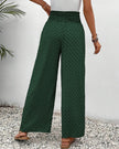 Green FJØRNA women's lightweight summer trousers with wide leg design, breathable fabric, ideal for warm weather.
