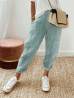 Green lightweight summer trousers for women by FJØRNA, straight leg style with drawstring waist, casual and comfortable fit.
