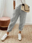 FJØRNA lightweight grey summer women's trousers with straight leg fit and drawstring waist, casual and comfortable for warm weather.