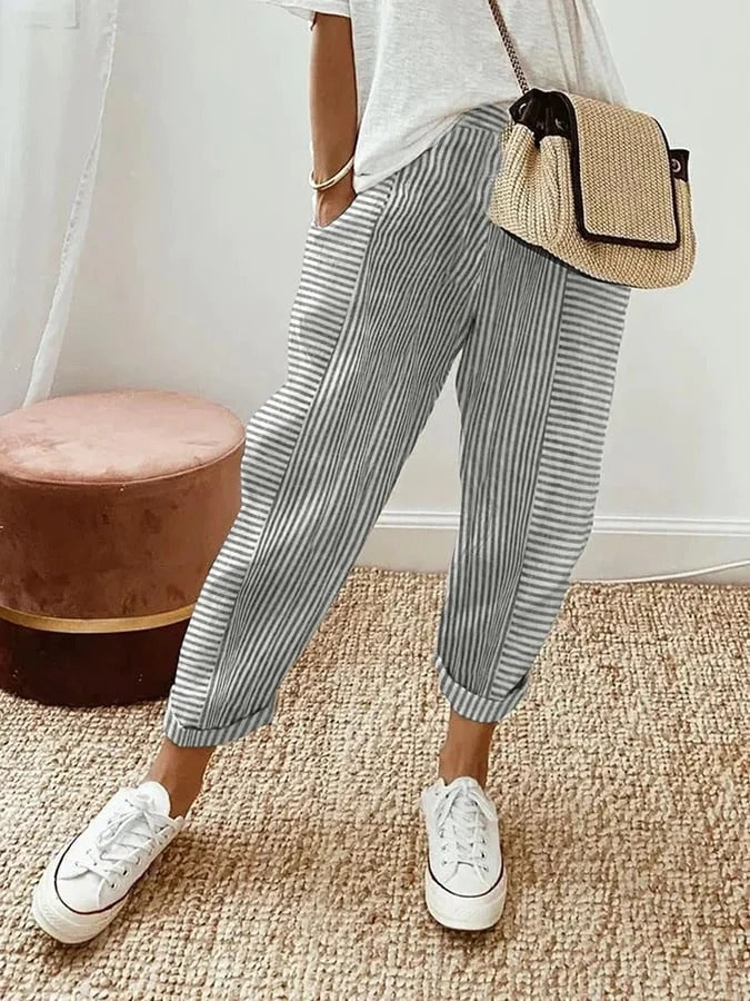FJØRNA lightweight grey summer women's trousers with straight leg fit and drawstring waist, casual and comfortable for warm weather.