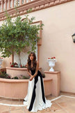 FJØRNA Griselda color block maxi slip dress in white, featuring a flowing silhouette and stylish design on a model.