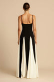 FJØRNA Griselda color block maxi slip dress in white with black accents, sleeveless design, flowing fabric, and V-neck style.