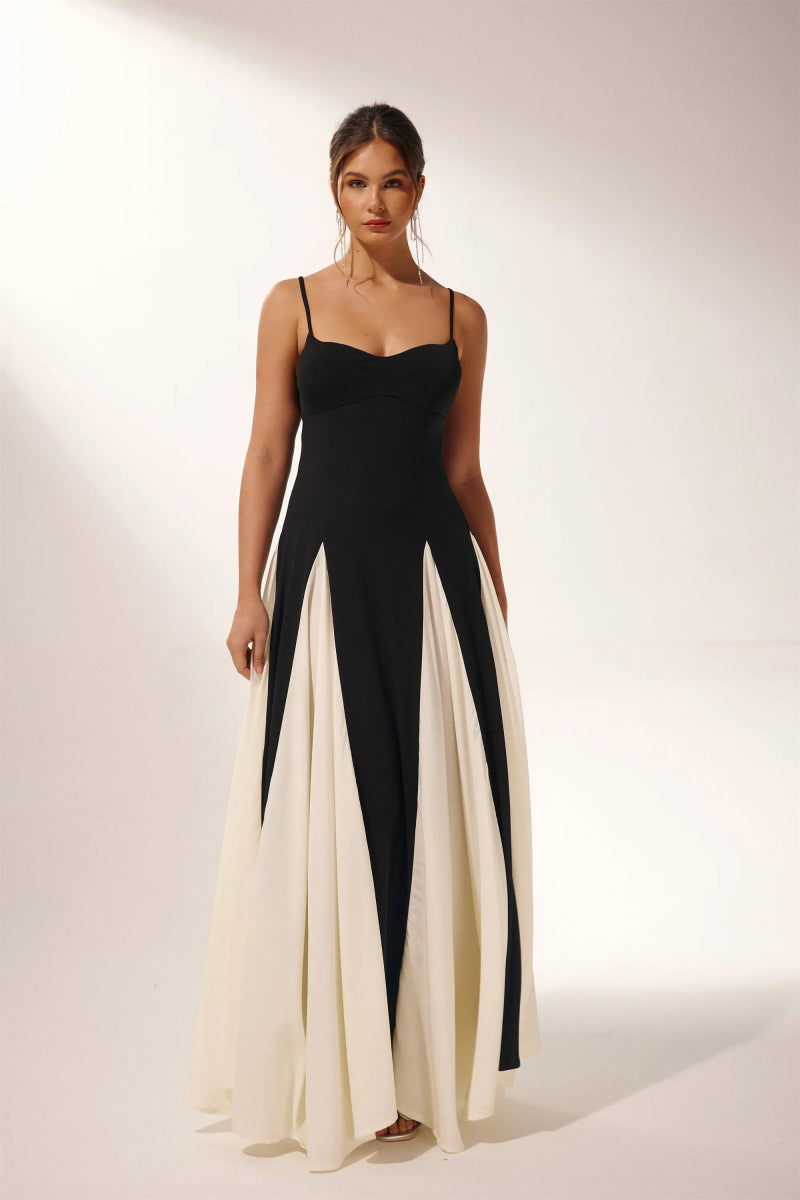 FJØRNA Griselda Color Block Maxi Slip Dress in white, featuring a sleek maxi dress design with bold color blocks.