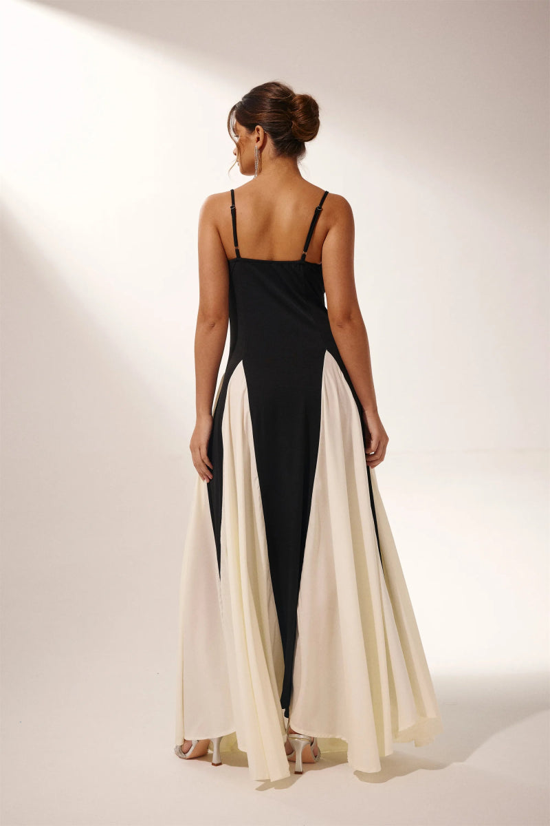 FJØRNA Griselda color block maxi slip dress in white, featuring a flowing silhouette and stylish design on a model.