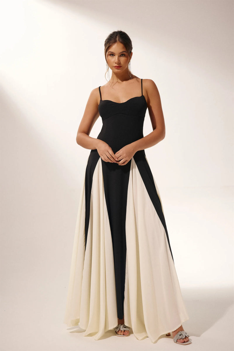 FJØRNA Griselda Color Block Maxi Slip Dress in white, flowing fabric with contrasting color blocks, sleeveless design.