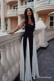FJØRNA Griselda color block maxi slip dress in white, featuring a flowing design and sleeveless style, displayed on a hanger.