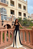 FJØRNA Griselda color block maxi slip dress in white and black, flowing sleeveless design with a relaxed silhouette.