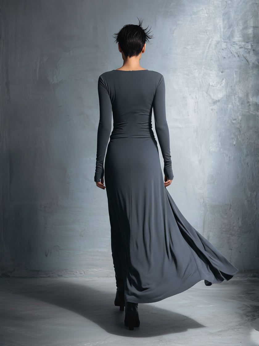 Grey knit wrap maxi dress for women by FJØRNA, featuring a flowing silhouette and soft knit fabric.