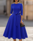 FJØRNA crew-neck A-line midi dress for wedding guests, elegant midi dress with a flattering silhouette and classic style.