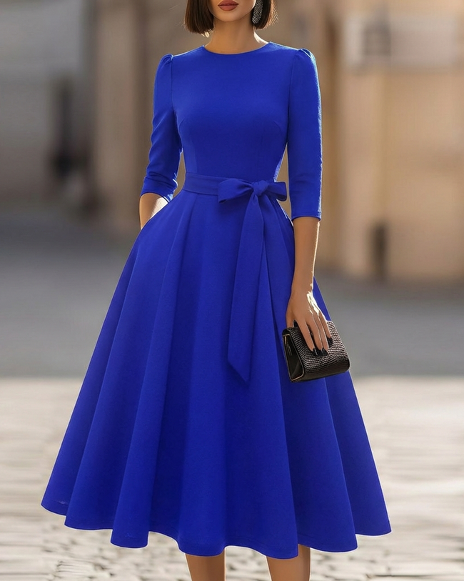FJØRNA crew-neck A-line midi dress for wedding guests, elegant midi dress with a flattering silhouette and classic style.