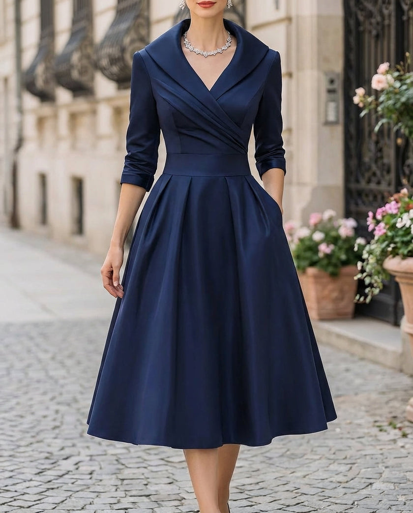 FJØRNA black satin trench-collar wrap midi dress for women, showcasing a sleek, elegant silhouette with long sleeves and a fitted waist.