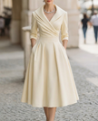 FJØRNA black satin trench-collar wrap midi dress for women, featuring a stylish silhouette and elegant design.