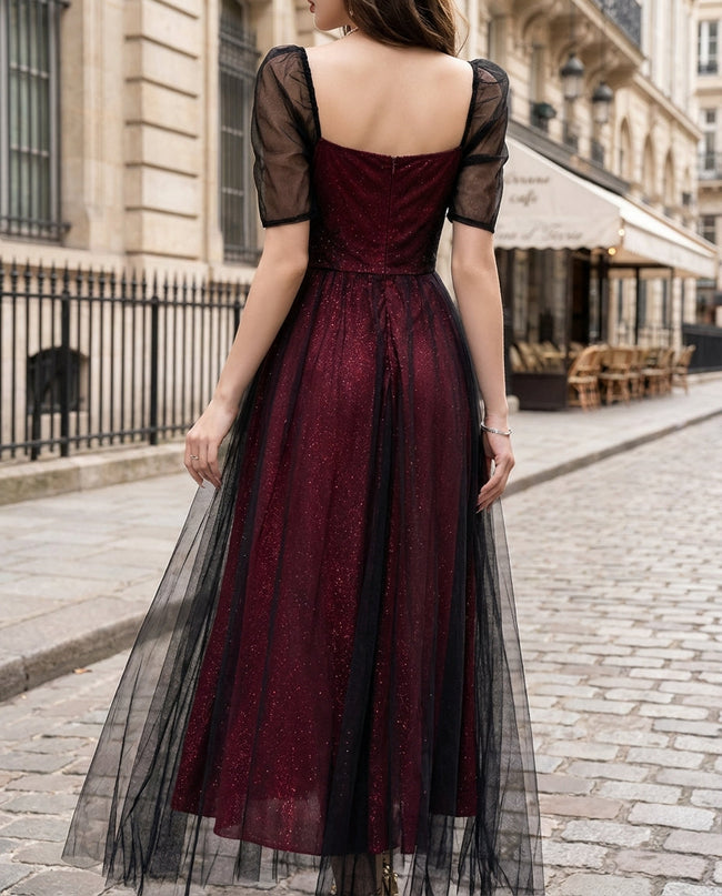FJØRNA sheer puff-sleeve lace A-line midi dress with intricate lace details and elegant silhouette, perfect for formal occasions.