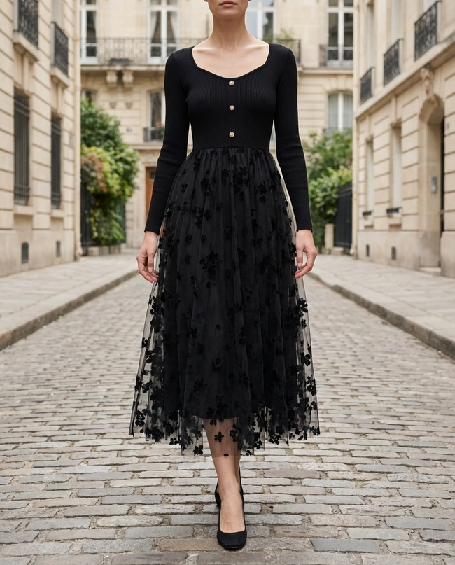 Black 3D floral embroidered mesh knit midi dress by FJØRNA, featuring intricate floral embroidery and a fitted silhouette.